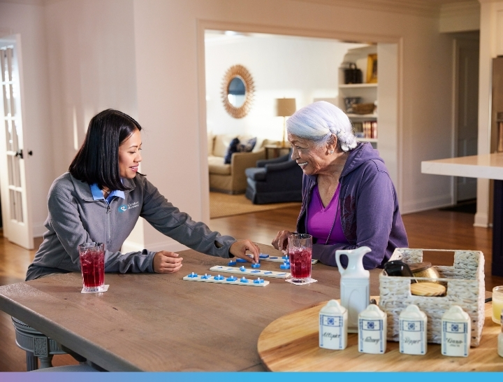 Comfort Keepers caregiver visiting with a senior client in Owasso, OK