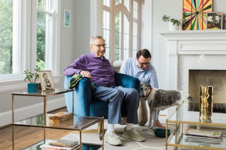 Father and son with dog