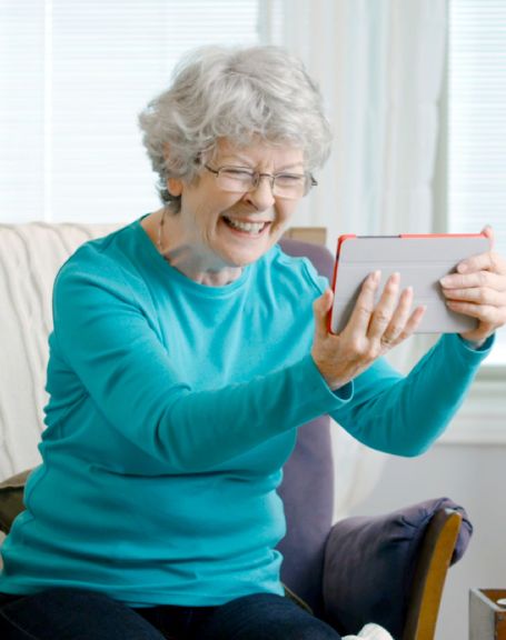 Senior with tablet