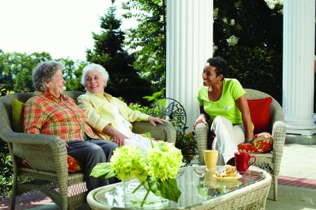 Friends sitting on a porch