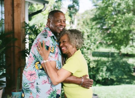 elderly couple dancing getting