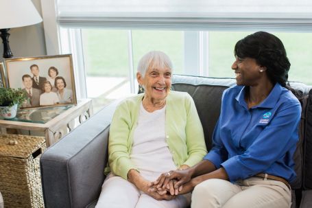 Caregiver laughing with client