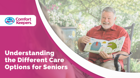 Aging man pictured holding a children's picture book with colorful monsters. He is sitting outside on a patio chair surrounded by potted flowers and trees. Image caption reads "Understanding the Different Care Options for Seniors "