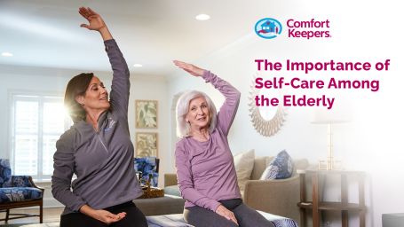 Two people doing stretches, as elderly woman and a younger woman