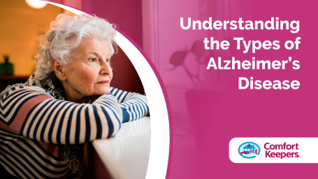 Elderly woman staring out of a window