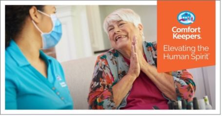 Smiling Woman with her Caregiver