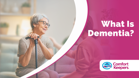 Older woman smiling at another younger woman