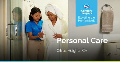 Caregiver helping senior woman out of bathroom. 