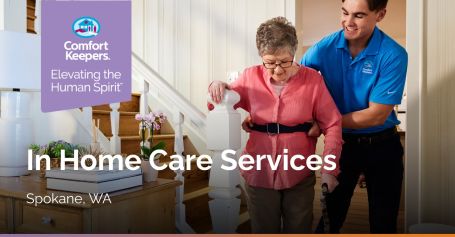 Caregiver helping senior woman down stairs in Spokane, Washington