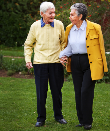 Senior couple enjoying a healthful walk.
