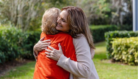 Loving family member supporting her Mom during the aging process