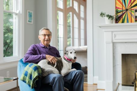 24 hour senior caregiver, 24 hour senior care in Fox Chapel, PA. Elderly man, smiling with dog