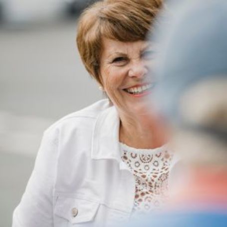 Comfort Keepers senior shares a laugh with friends