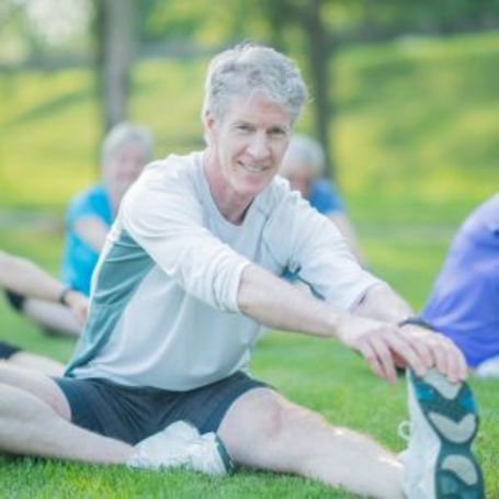 Comfort Keepers Senior in a group exercise class