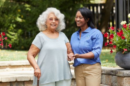 Senior woman being assisted at home in Centereach to prevent hospital readmission.