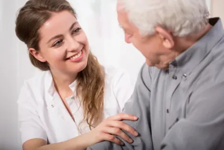 Senior checking with healthcare provider about new drugs