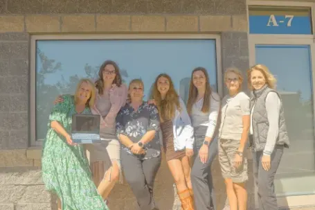 Comfort Keepers senior care team photo outside the Comfort Keepers office in Durango