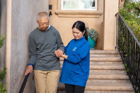 Home Health Aide Helping an elderly gentleman 
