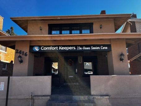 > Deborah De Santos and the Comfort Keepers El Paso team collecting toy donations for the Rotary Year of Cheer.