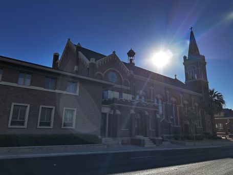 Senior care attending mass at St. Patrick's Cathedral  El Paso during a Mahjong game