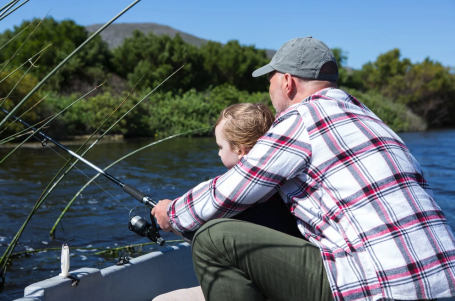 Veteran fishing with their child in Chisago