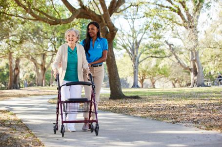 Caregiver with adult daughter and senior loved one