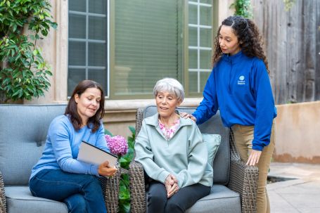 Adult daughter and a Comfort Keepers caregiver with a senior at home in Cherry Hill, NJ