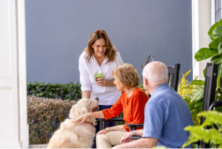 Family relaxing on a porch