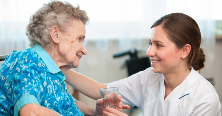 Senior Sitting with caregiver