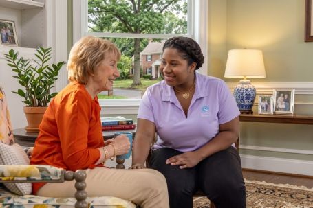 Comfort Keepers caregiver talking with an older woman in her Edison, Middlesex County living room