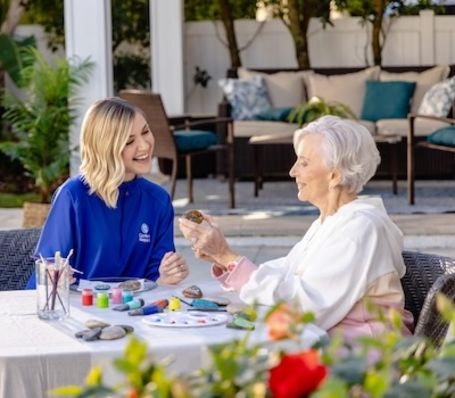 caregiver doing crafts with client