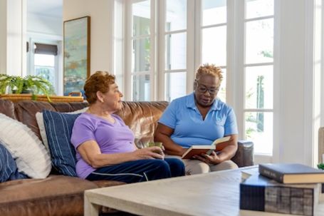 caregiver reading to client