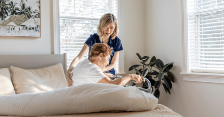 caregiver helping senior