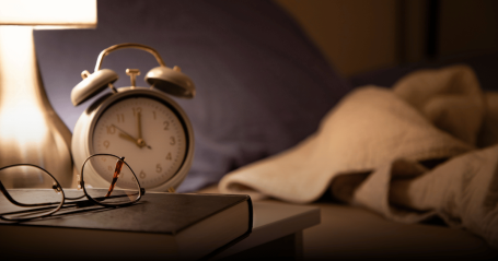 clock next to bed at night