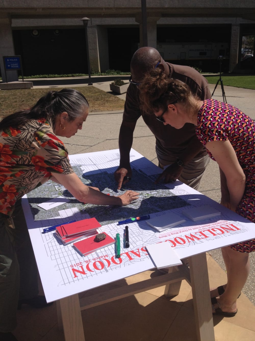 Participants at table on sawhorses