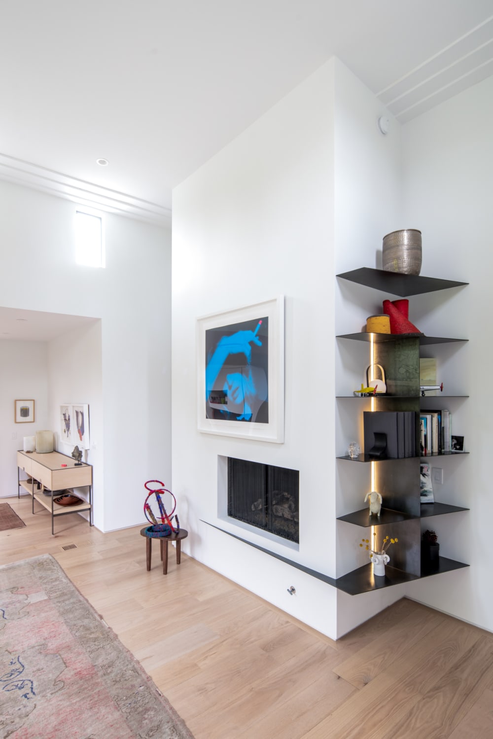 Room with corner shelving unit