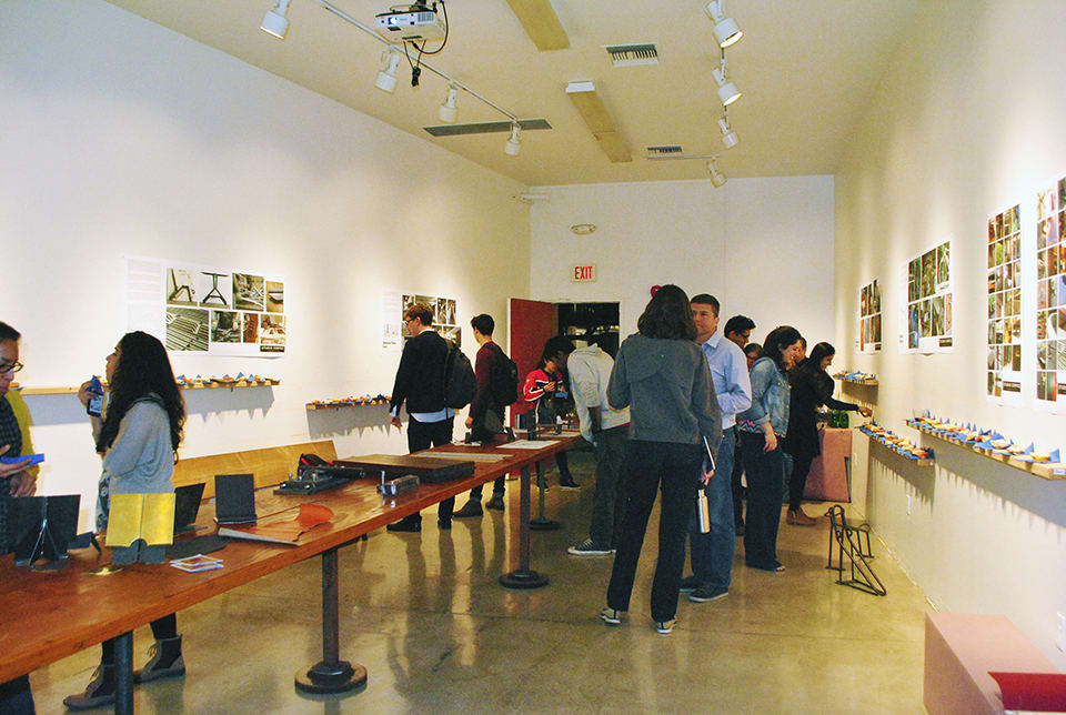 People milling about a gallery