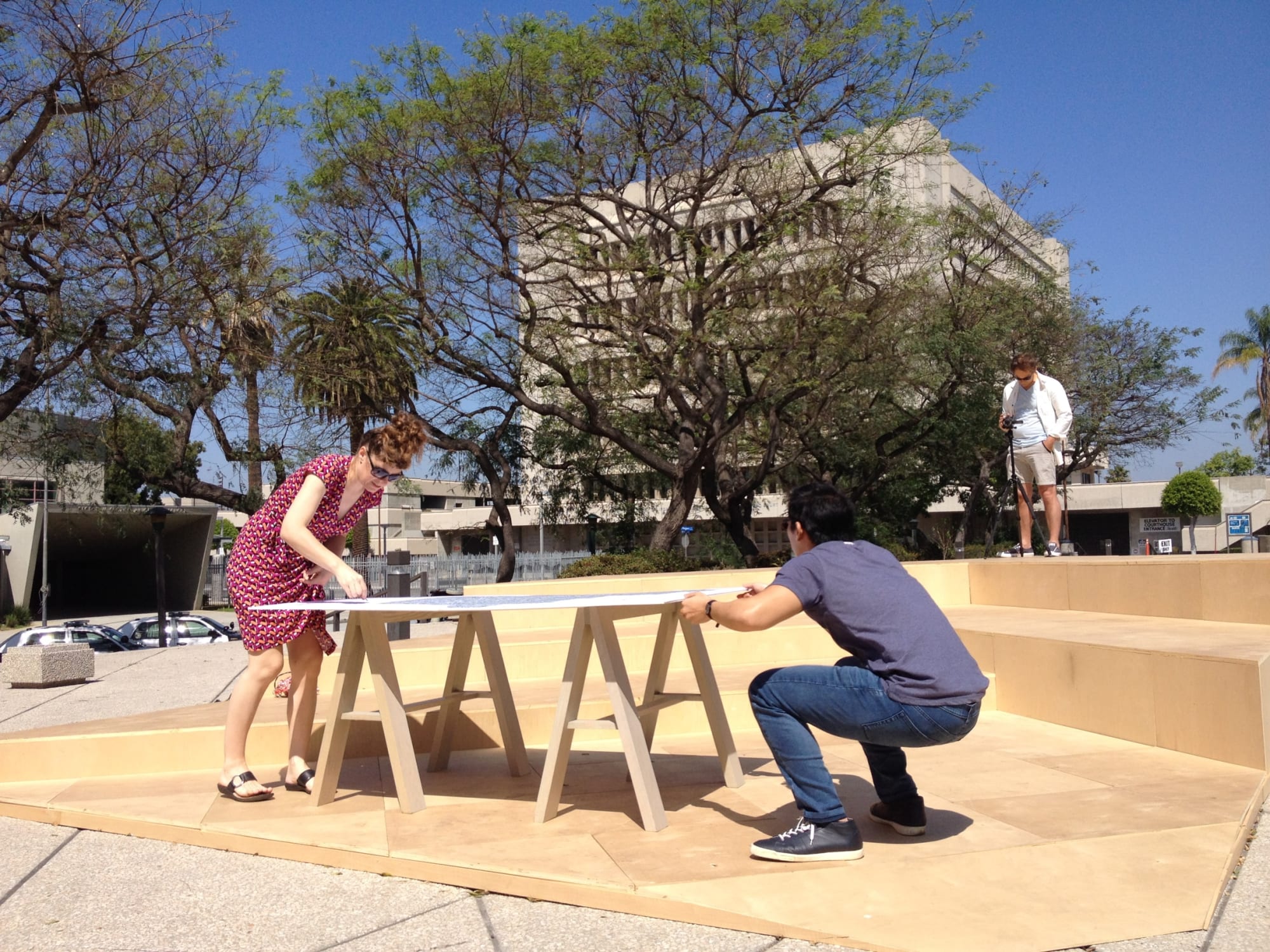 Participants at table on sawhorses