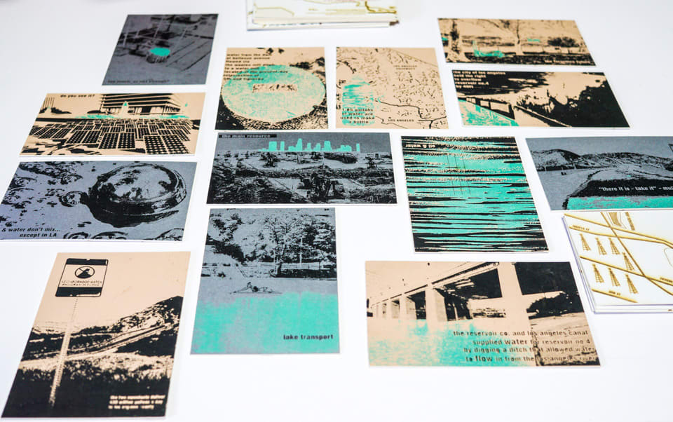 Postcards laid on table