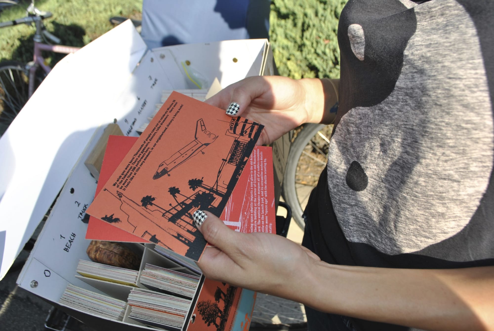 Hands with postcards
