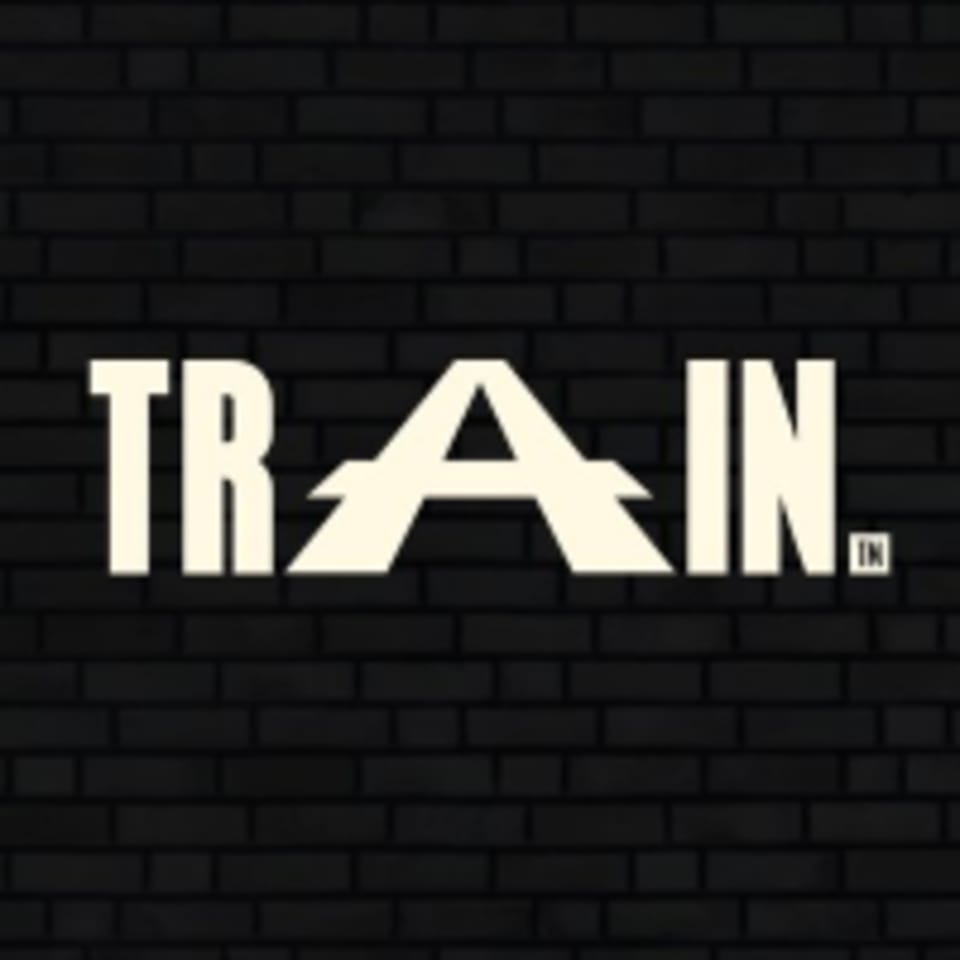 TRAIN Manchester logo