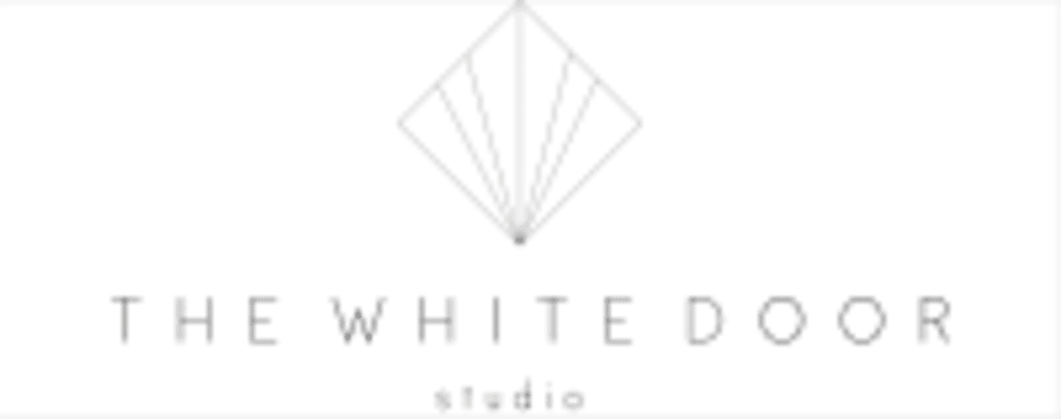 The White Door Studio logo