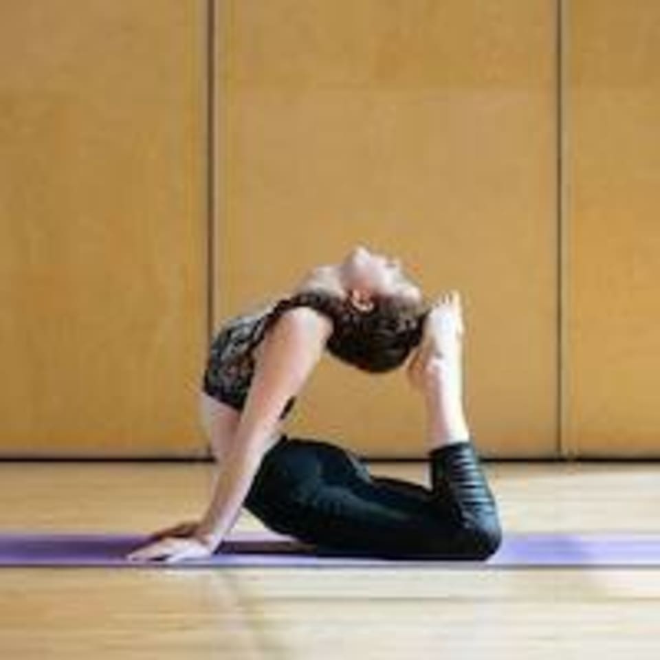 Ella Tighe Yoga logo