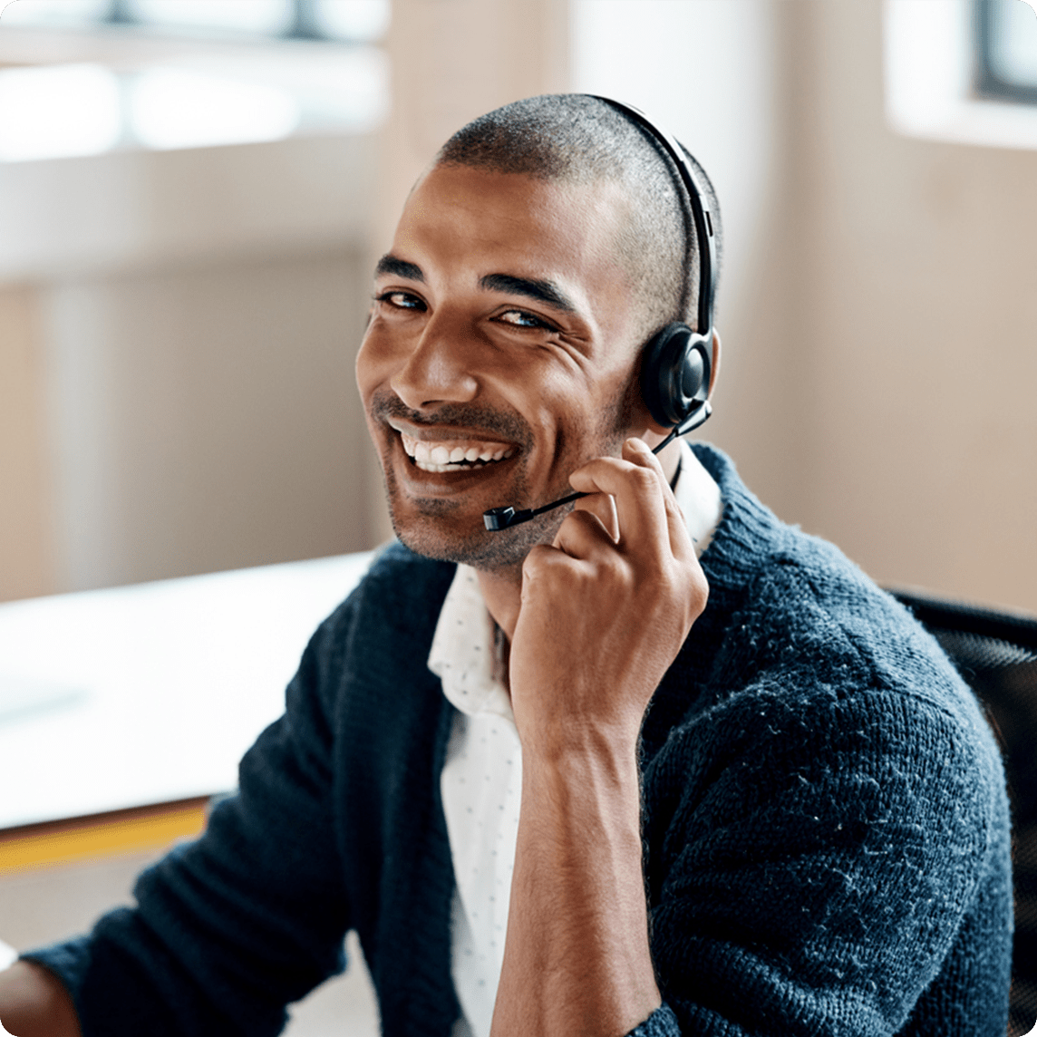 Customer service representative wearing a headset telephone