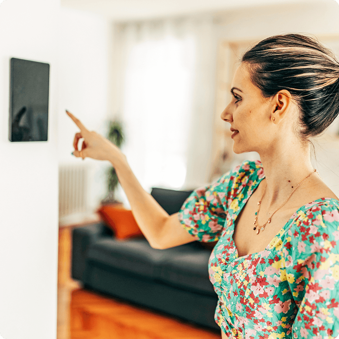 Woman using wall control