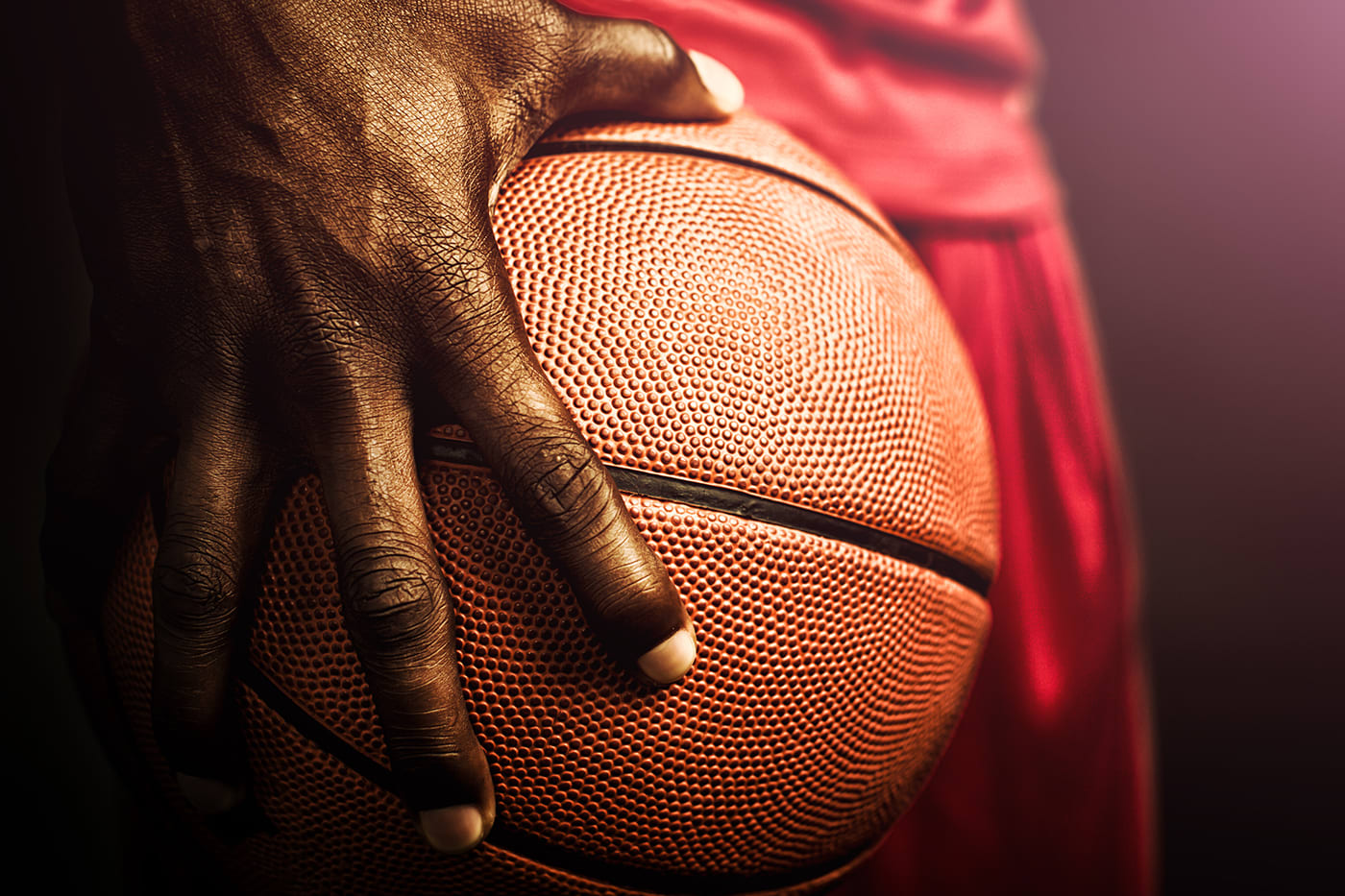 basketball player palming ball