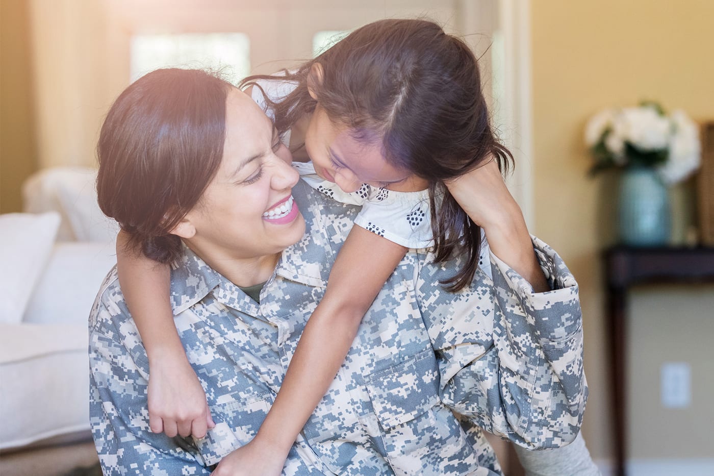 military mom smiling at daughter