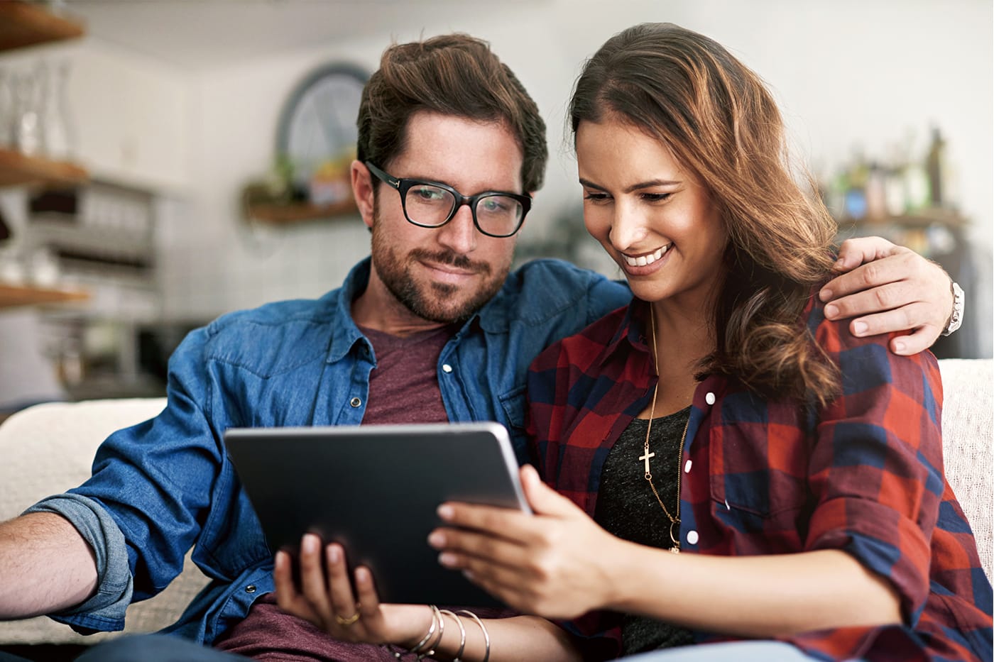 Couple looking at tablet