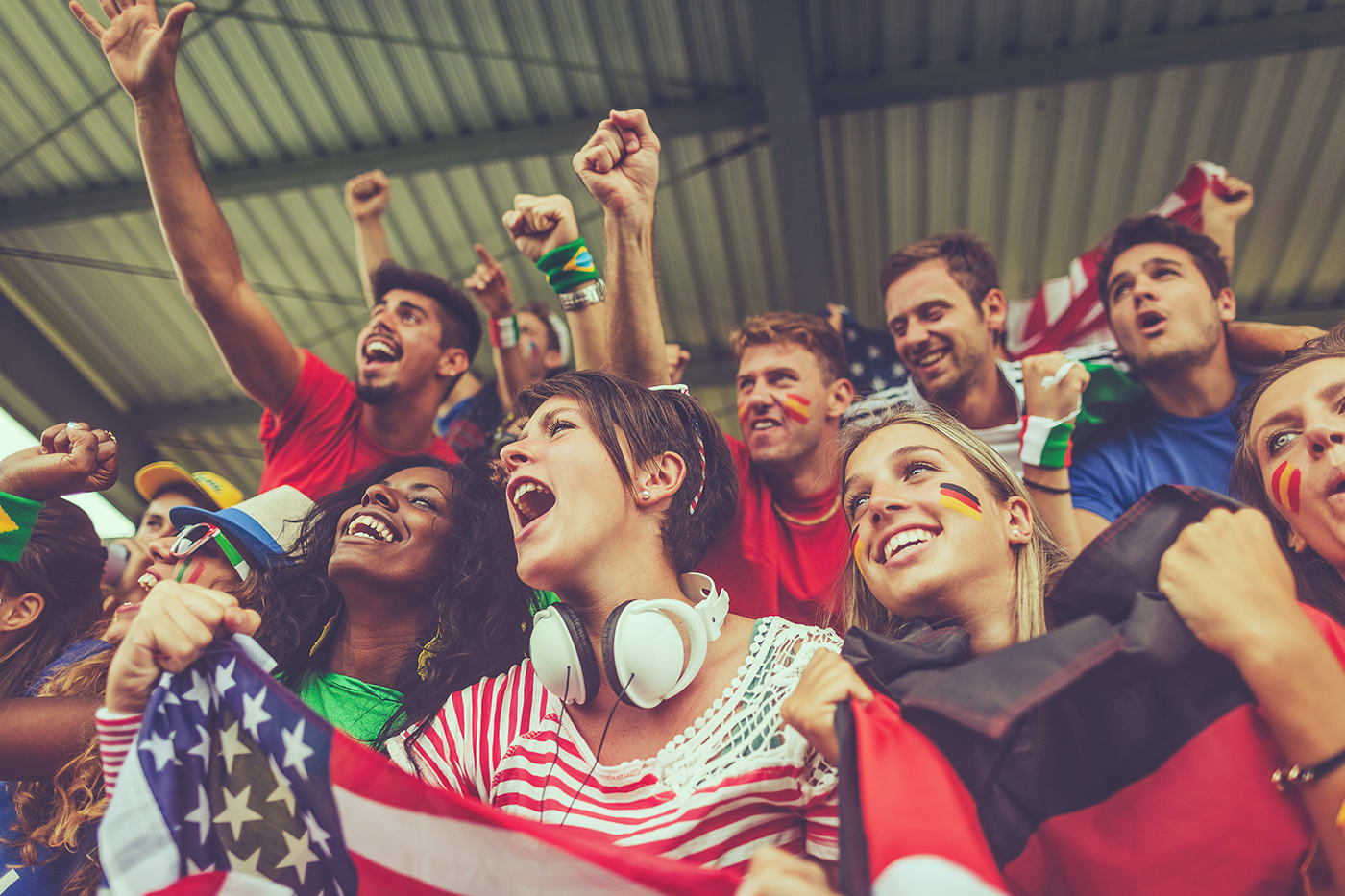 Fans cheering at a sporting event