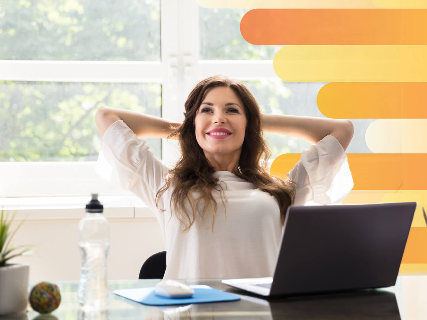 Woman relaxing in her home office chair and enjoying her internet.